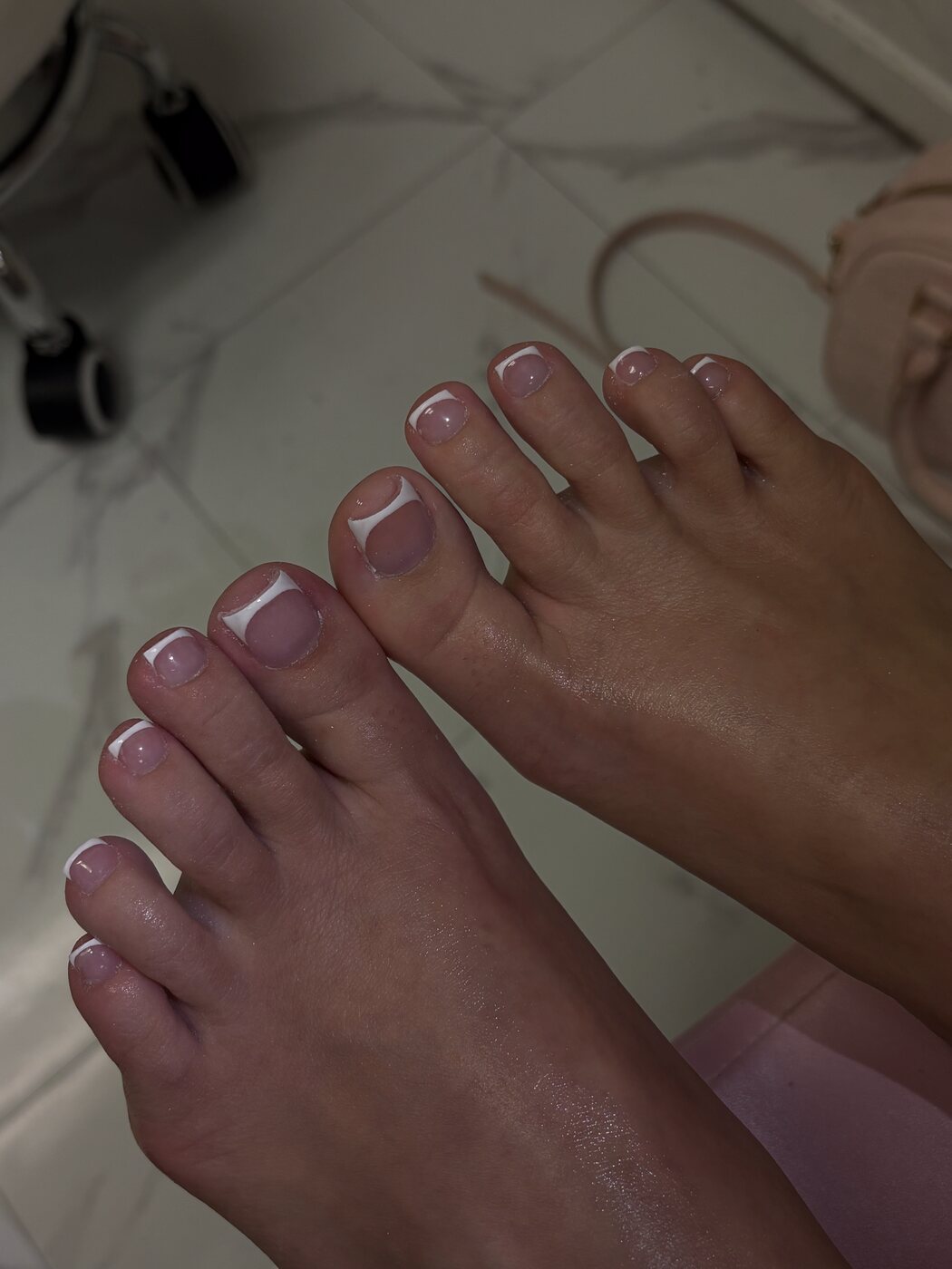 Clean white French pedicure
